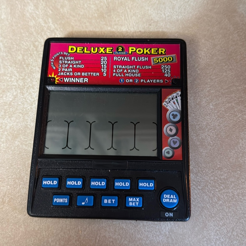 Radio‎ shack deluxe poker hand held game